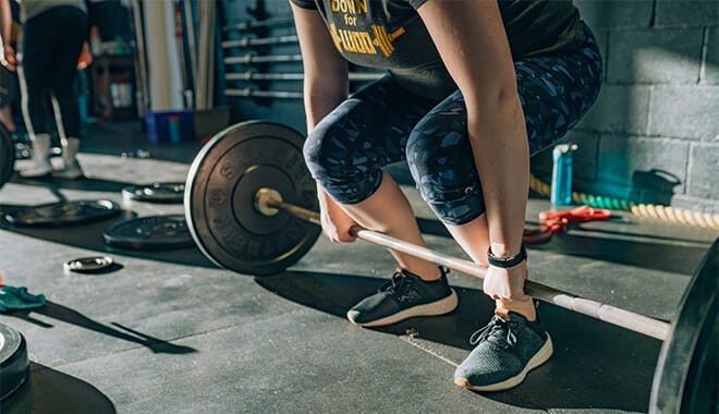 woman lifting weights